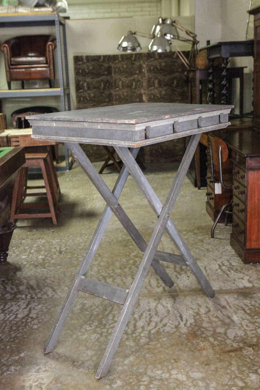 A French, 1840s presentation table on X-shaped foldable platform. Used for displaying models or sculptures. Also can be used as occasional table for other displays.