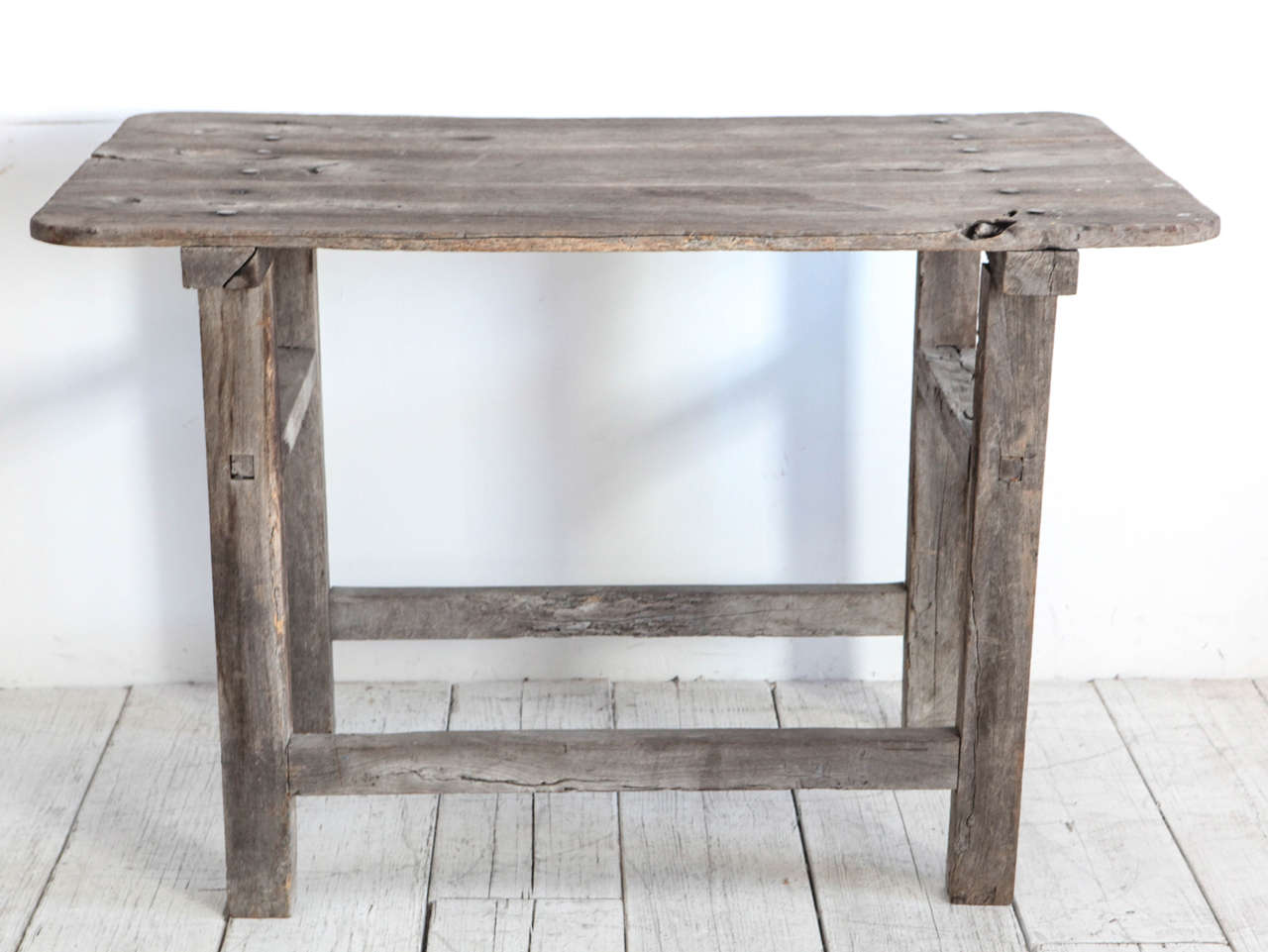 Vintage bar height table in distressed rustic grey patina. Top is detachable.