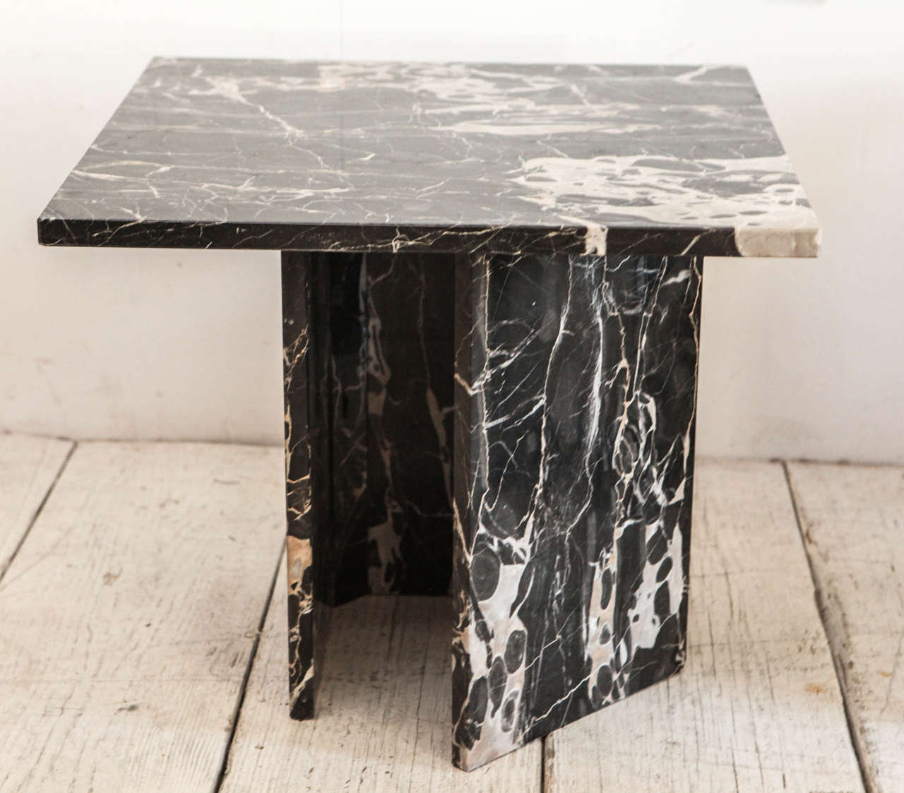 Great modern black and white side tables or grouped together as a small coffee table.