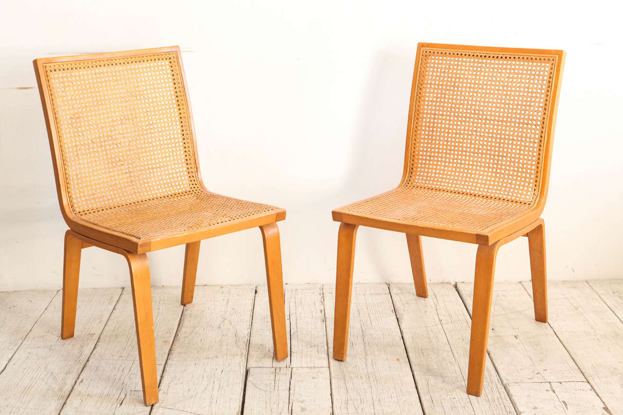 Dining chairs with perfect original cane seats and bentwood legs.