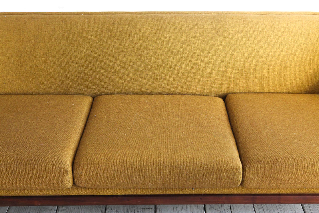 sofa with rounded back