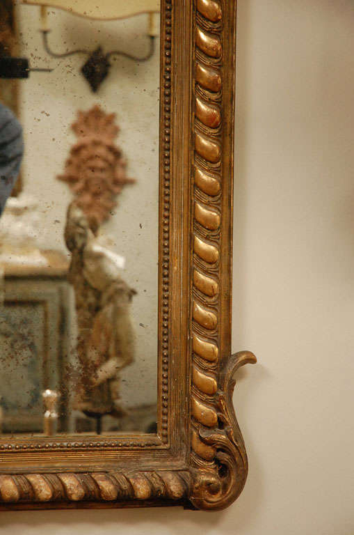 Carved French Mirror With Parcel Gilding In Good Condition In Los Angeles, CA
