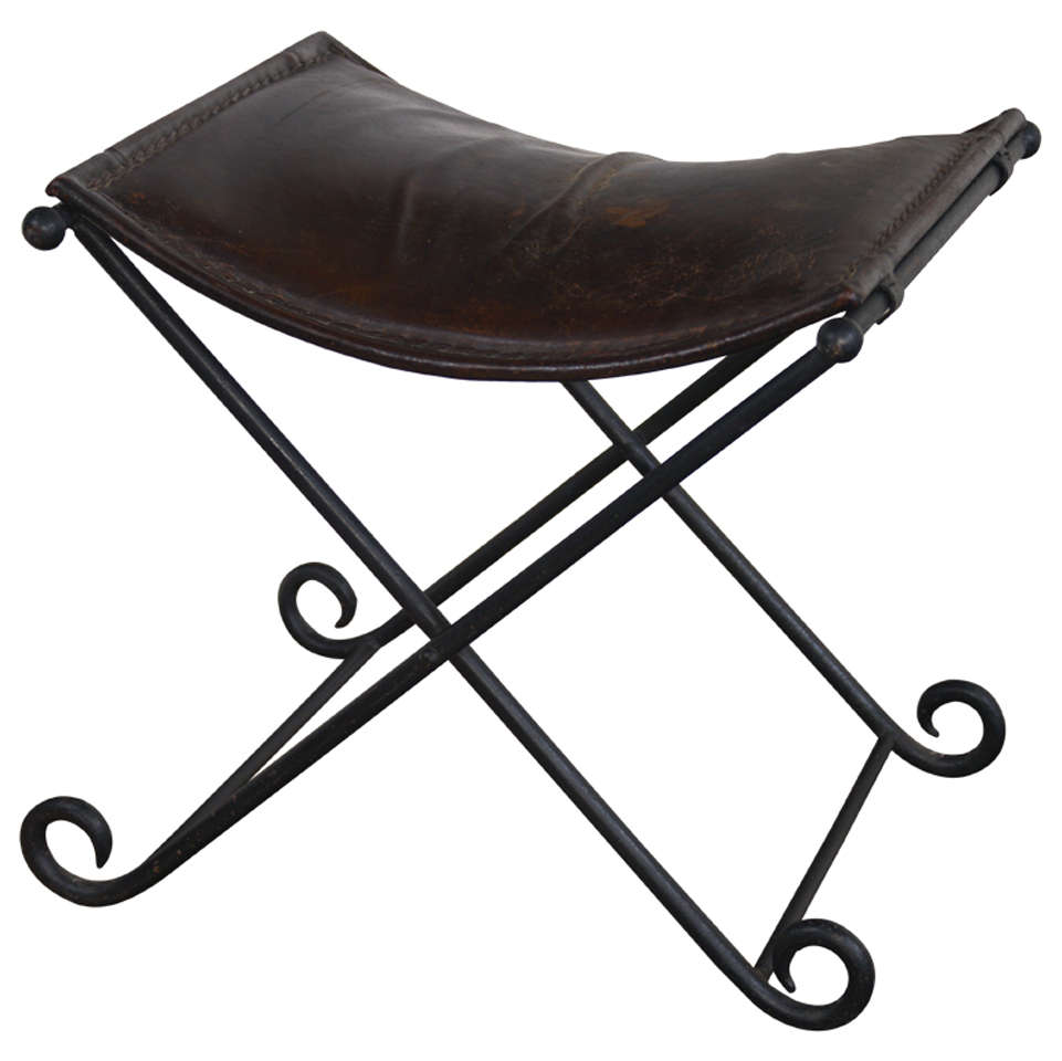 20th c. French hand folding, iron bench with leather seat at