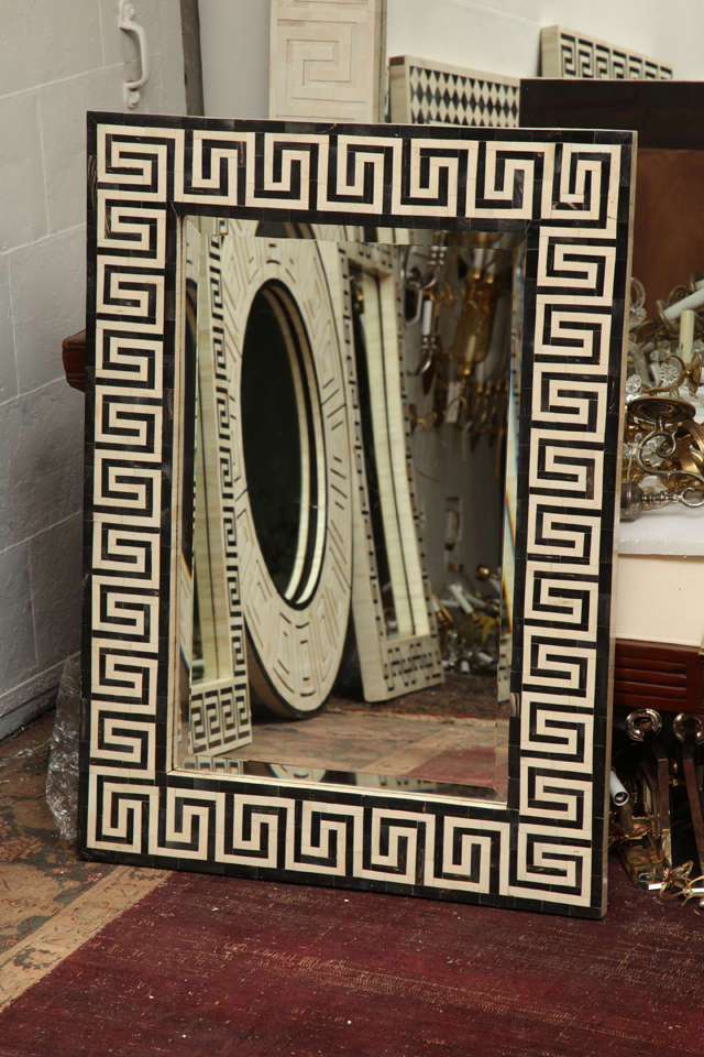 rectangular bone and horn mirror with black border and greek key motif
