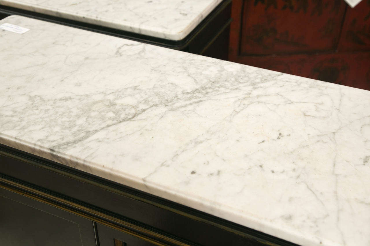 Hollywood Regency Pair of Jansen Style Marble Top Cabinets.