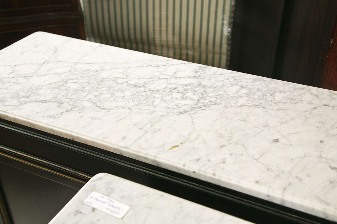 French Pair of Jansen Style Marble Top Cabinets.