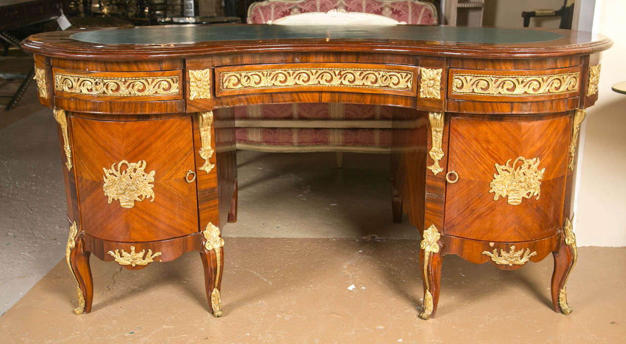 A Walnut Bronze Mounted Kidney Shaped Desk