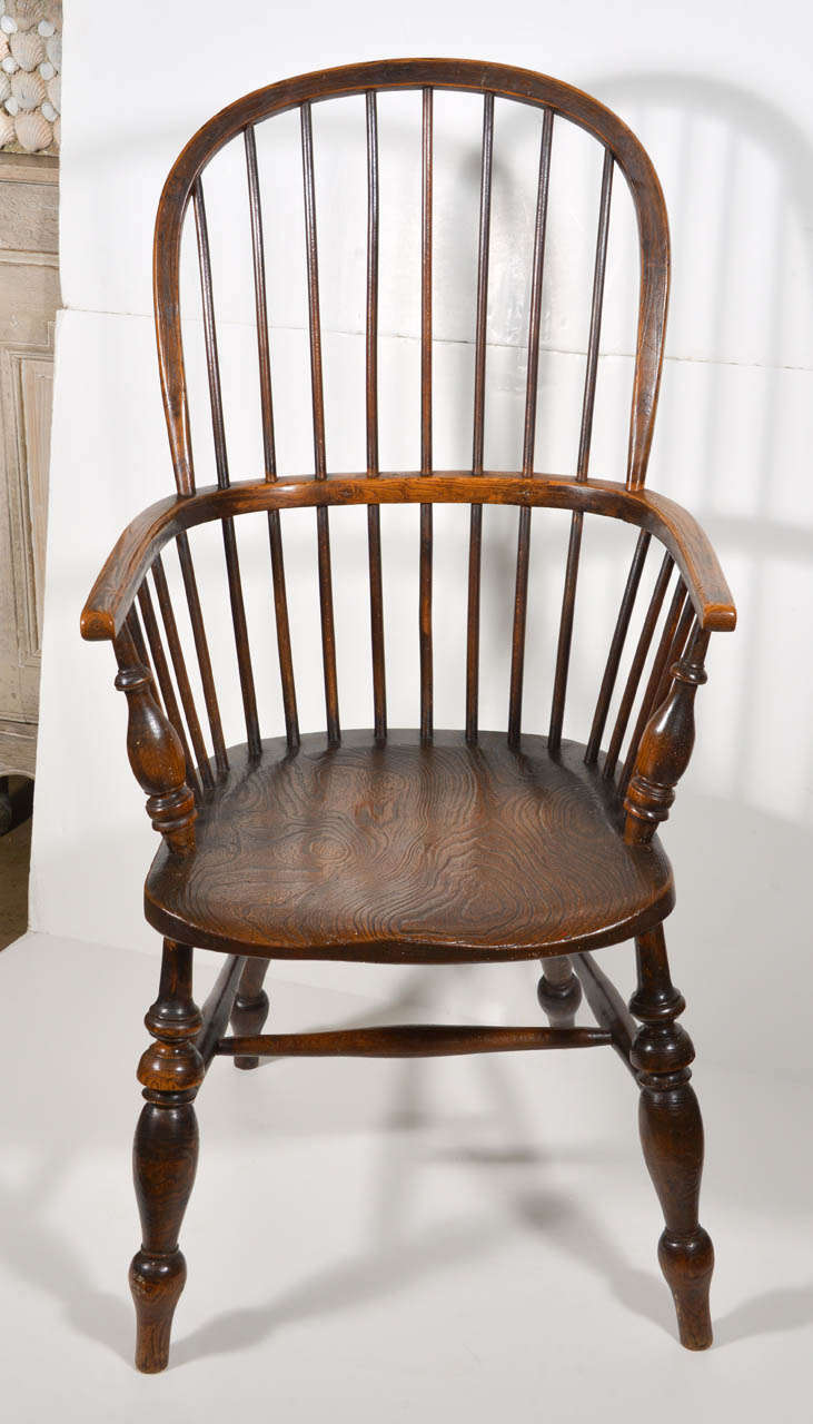 18th c. Oak Windsor chair. Wonderful wood graining on the seat which adds character.  Traditional lines, very sturdy.