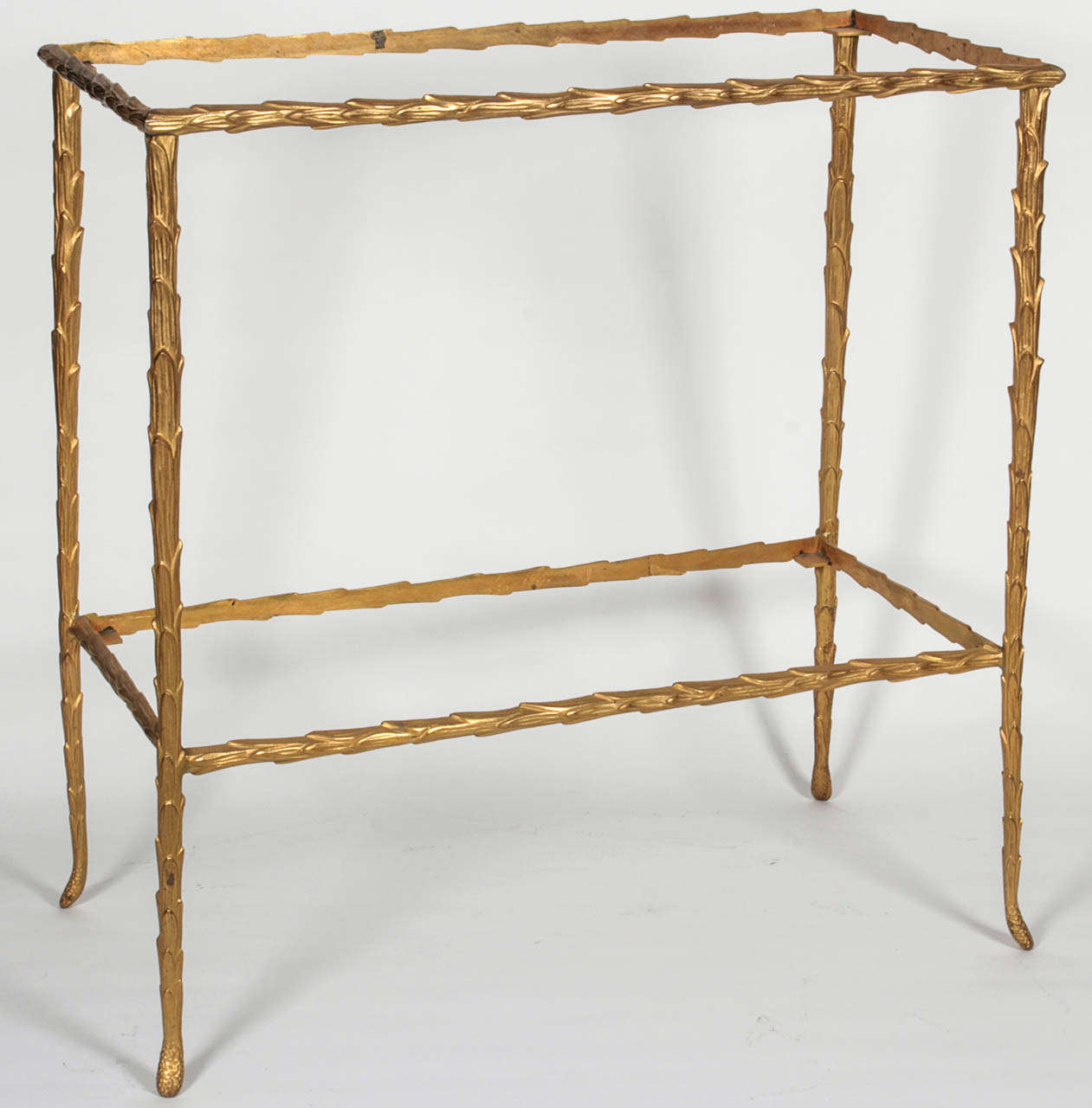Bronze faux bamboo console table with lower shelf attributed to Bagues.  France, circa 1950.  Ideal size for use as a small console, sofa table or end table.  Price includes custom glass in choice of finish: clear, white, black, smoked or antique