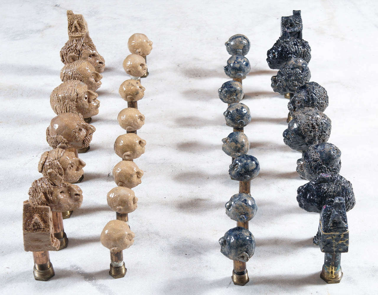 complete chess set - each piece individually hand sculpted - mounted on copper plumbers pipe - 