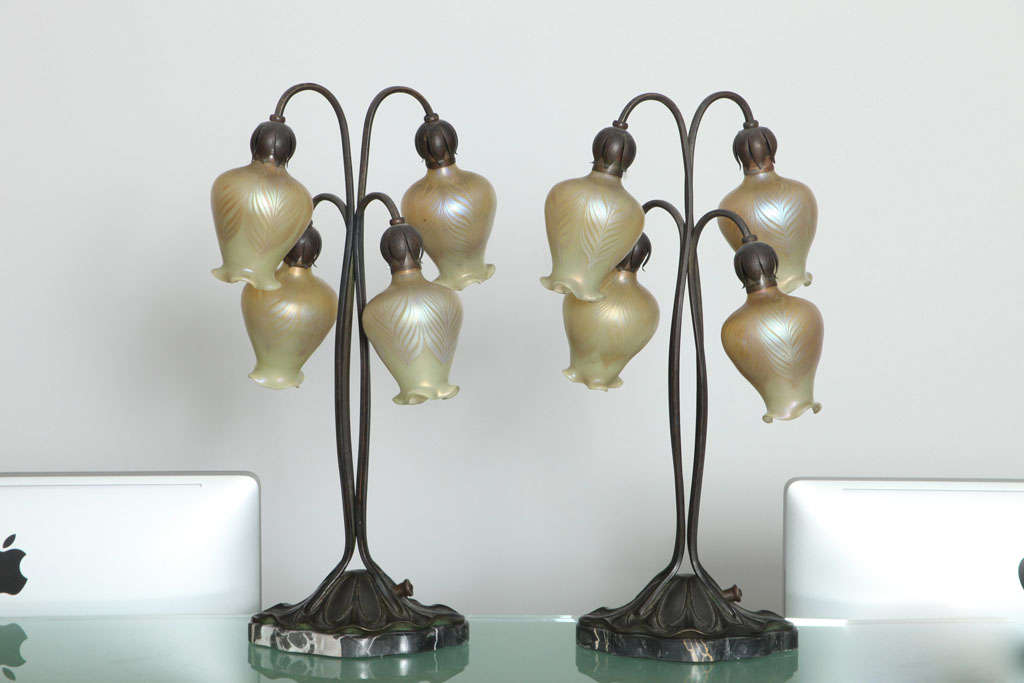 An Austrian Art Nouveau pair of patinated bronze 