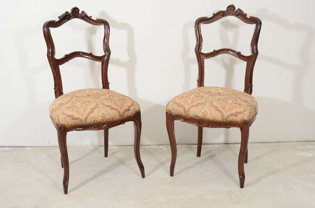 Pair of french mahogany side chairs with french polish finishing and new upholstery with nails.