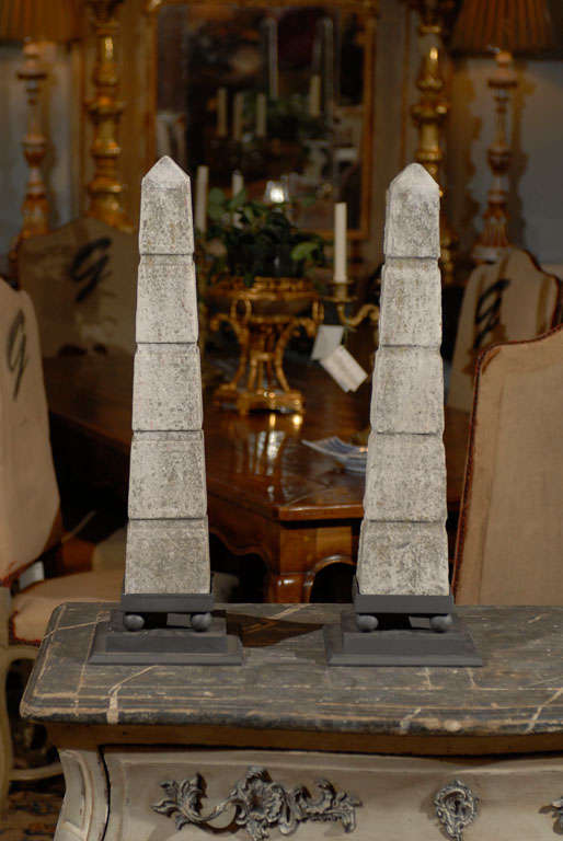 Pair of Vintage French Marble Obelisks, Circa 1900
Placed on new iron stands, these tall neutral obelisks will add an architectural element to your space.