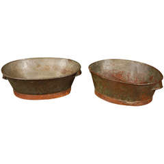 Pair of copper wash basins  with iron bases