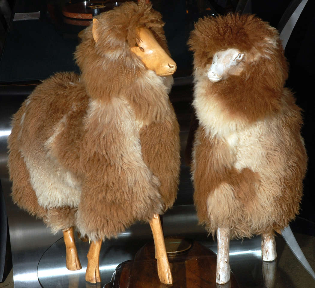 Pair Of Solid Wood Decorative life size sheep In the style of Francois- Xavier Lalanne.
Dim.
W 22