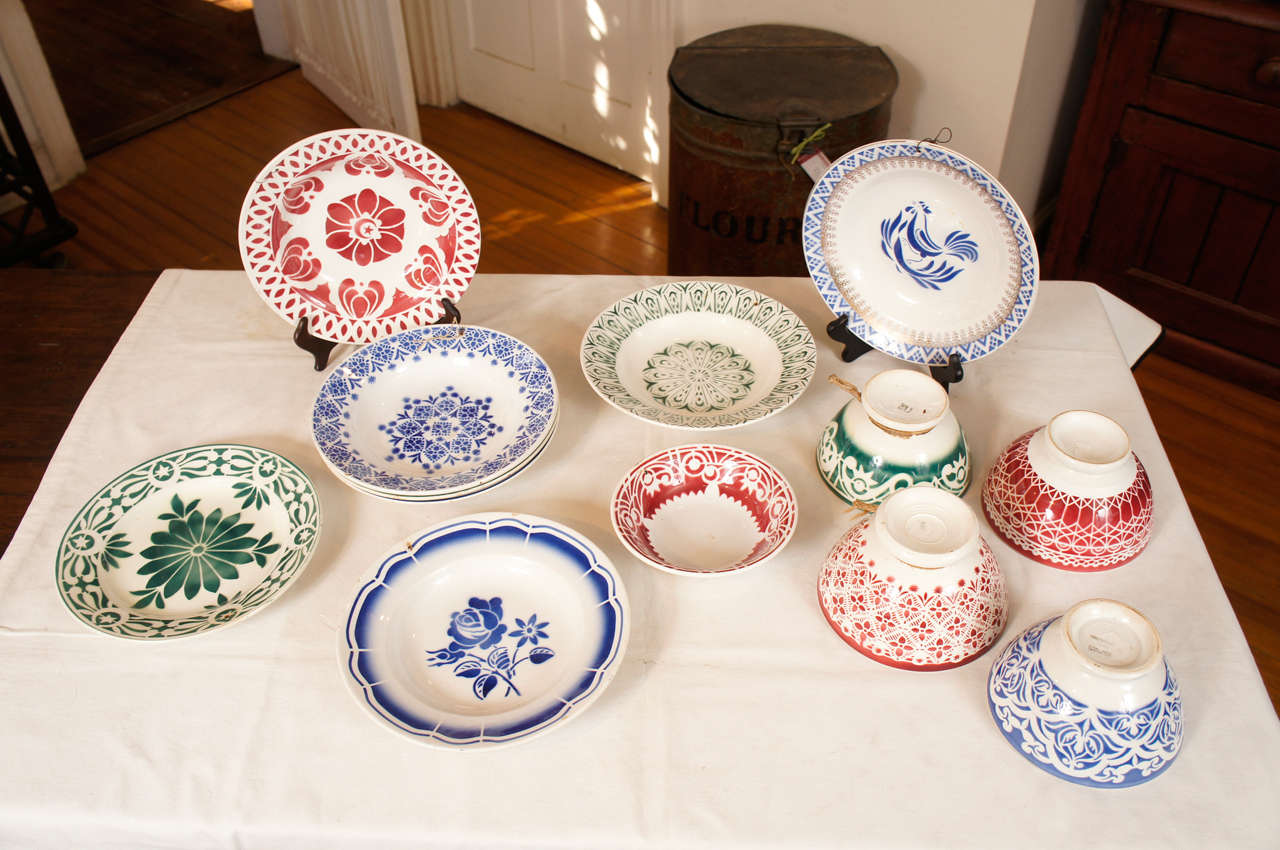 This collection of circa 1930 China is one of our favorite collections in the store. Done is beautiful patterns and vibrant colors of reds, blues and green the maker originally started making 