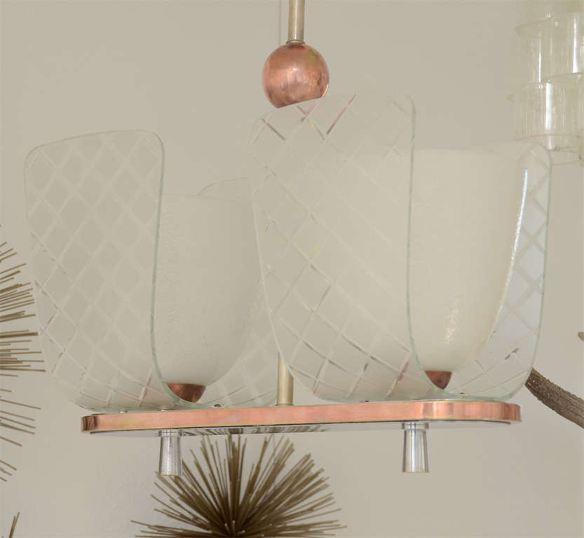 Murano two-light ceiling fixture featuring copper finish accents and conical frosted glass globes contained within criss-cross etched glass shades. Two standard lights.