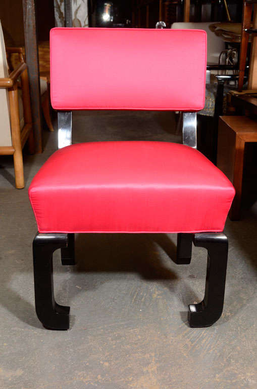 Pair of occasional chairs by James Mont in black lacquer finish with magenta silk upholstery. Chairs are signed.
21? w, 18? d, 16 ½? height to seat, 31 ½? overall height