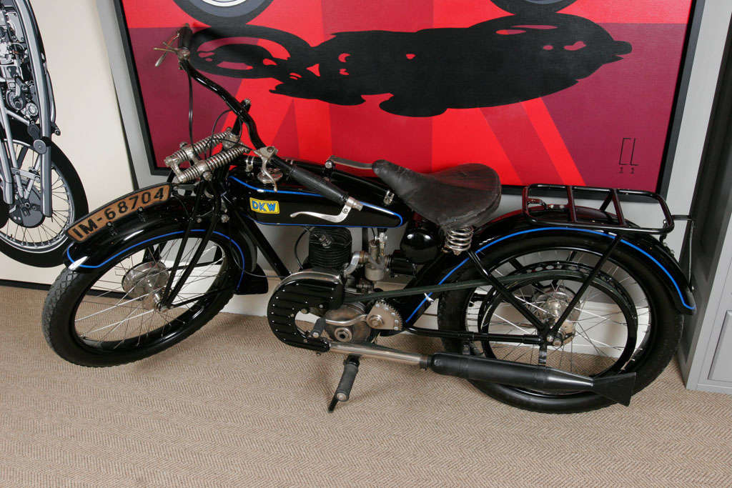 DKW was founded in Zschopau in 1919 by Danish engineer Jorgen Rasmussen and built its first motorcycle power unit, a single-cylinder, clip-on engine for bicycle attachment, in 1921. Designed by Hugo Ruppe, this 122cc motor was a two-stroke and DKW