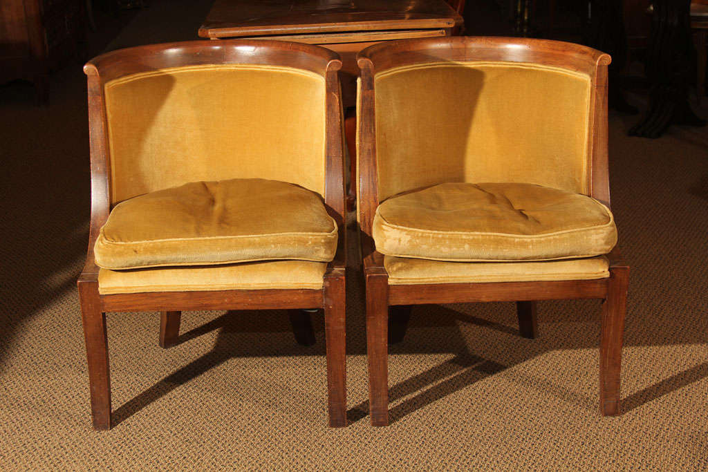 Pair of Italian Barrel Chairs

This is a pair of Italian Barrel or 