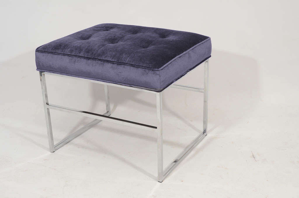 Pair of beautiful and crisply upholstered chrome ottomans with tufted velvet cushions. The color is a beautiful lavender/grey. Located at ABC Home 646-602-1519