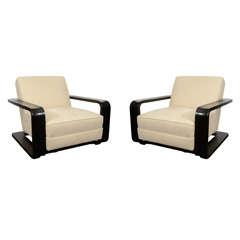 Pair Of Open-arm Lounge Chairs