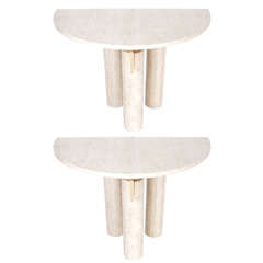 A striking pair of Italian marble console tables