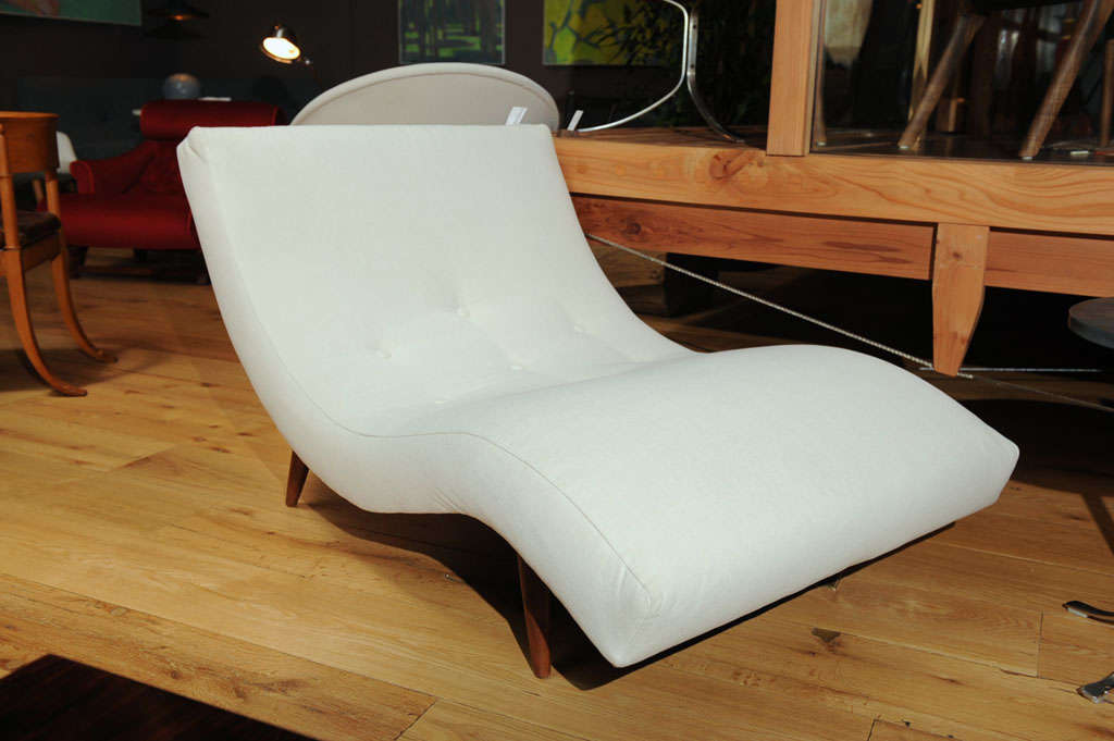The ?Wave? chaise with oak legs, made by Adrian Pearsall. Recently reupholstered in an off-white cotton.