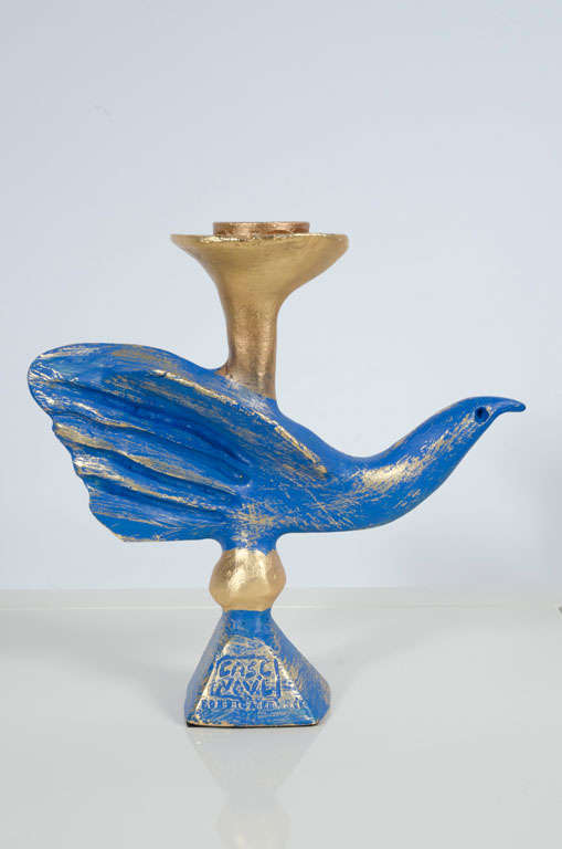 A gorgeous candlestick in gilt and Azure blue painted bronze in the form of a dove. By Pierre Casenove for Fondica. Signed and dated. France, 1994.