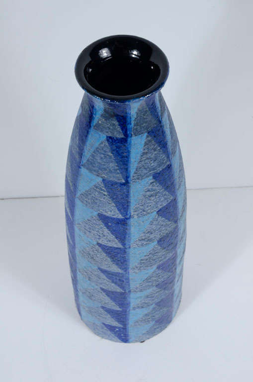 tall blue ceramic vase