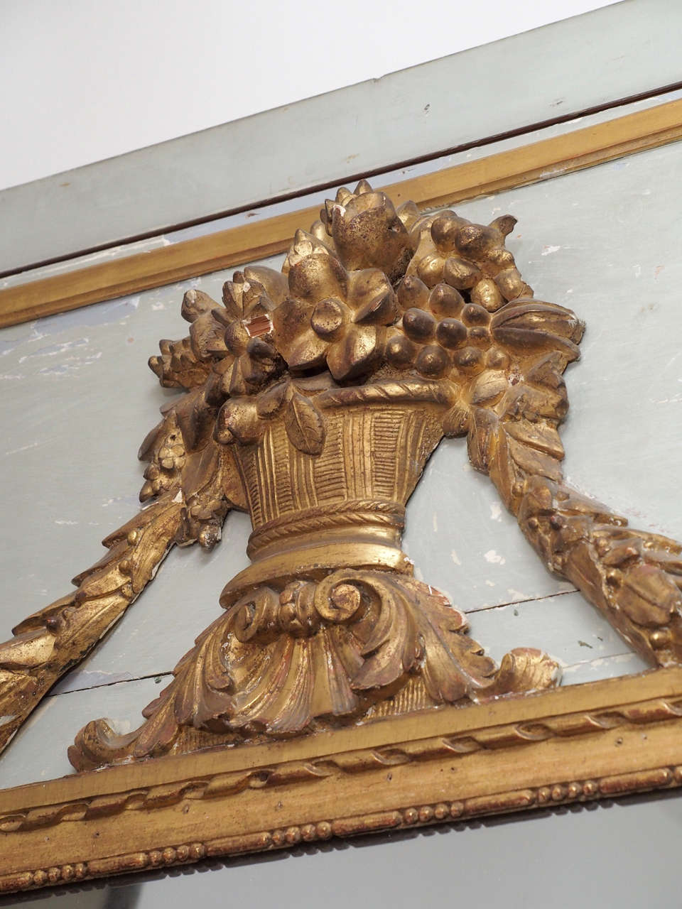French Tall Early 19th Century Louis XVI Style Mirror with an Urn and Garland Ropes For Sale