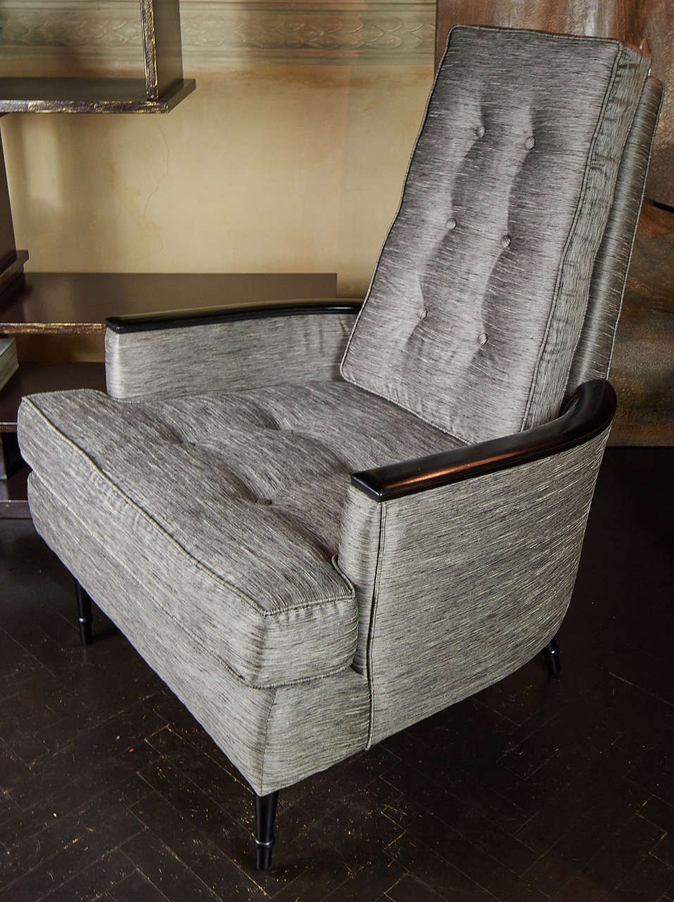 High back armchairs newly reupholstered in grey silk shantung, ebonized wood details.