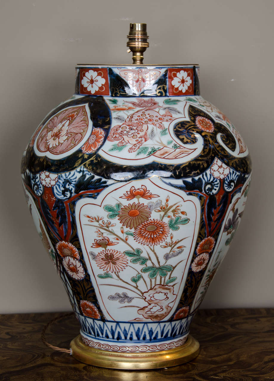 Early 18th Century Lamped Richly Decorated Imari Baluster Vase