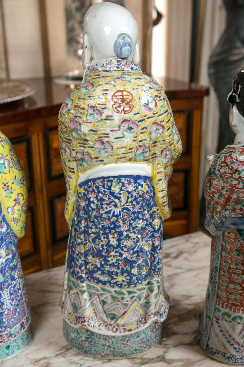Porcelaine Ensemble de trois figurines d'immortels chinois en porcelaine