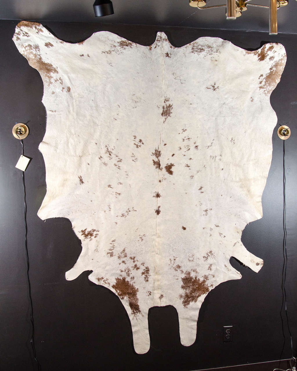 Beautiful Vintage White Cowhide Rug with Natural Spotted Hues of Cognac.