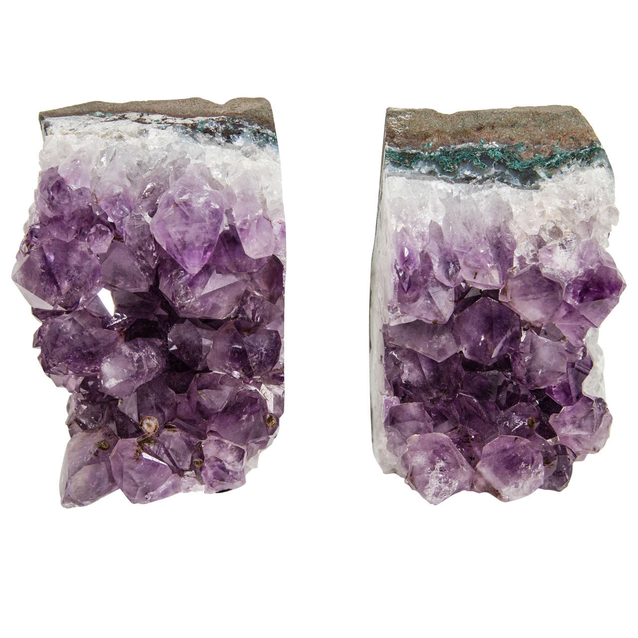 Pair of spectacular crystal amethyst bookends with wedge block cut.  The specimens features polished sides with rough edges in hues of slate and green stone, with protruding chunks of quartz.  They are gorgeous from all angles and can be used in a
