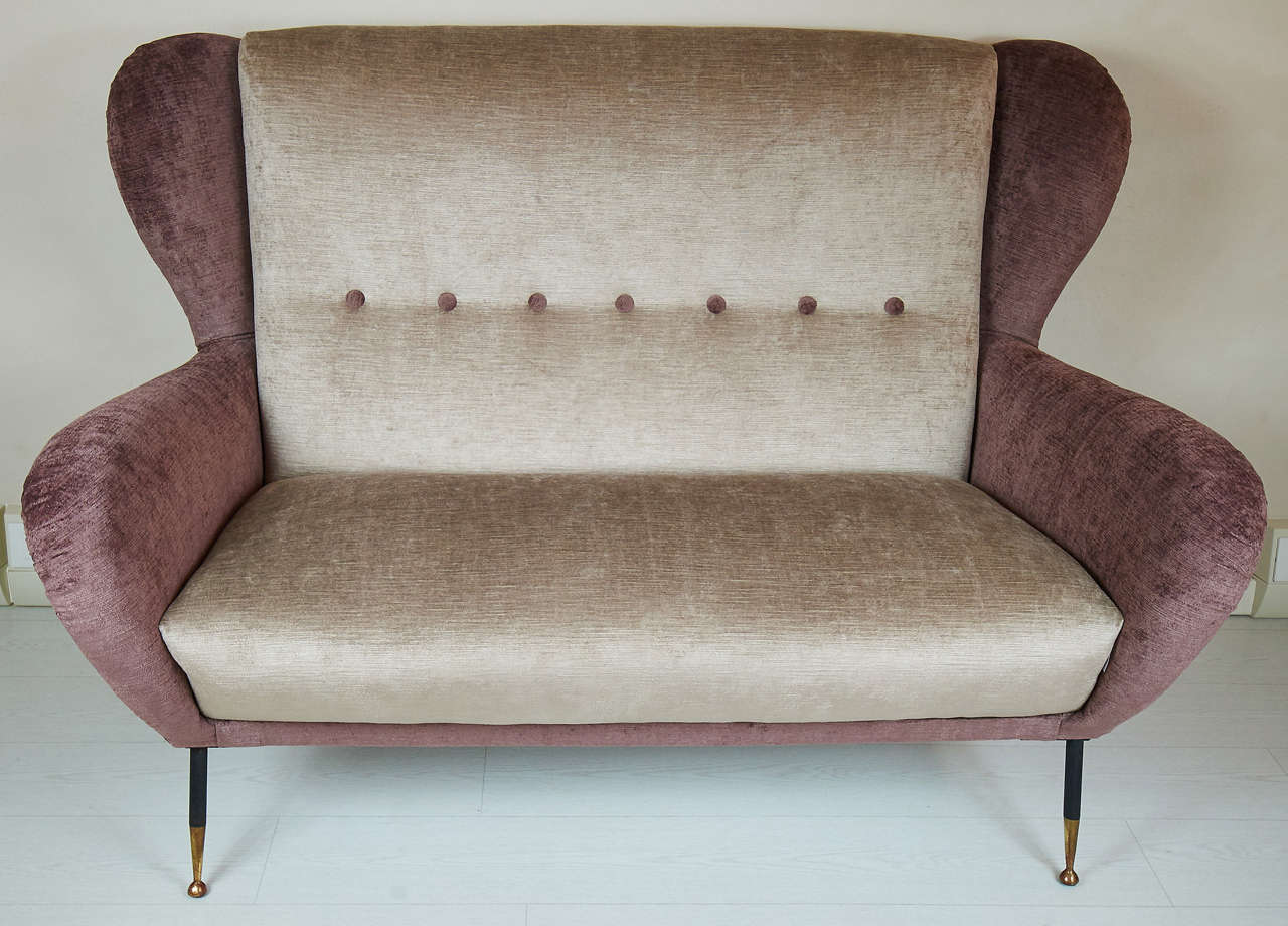 Two-seat well shaper and comfortable with high back sofa.
Newly upholstered with double color velvet.
This sofa is matching with a pair of armchairs and could be sold alone or together.
