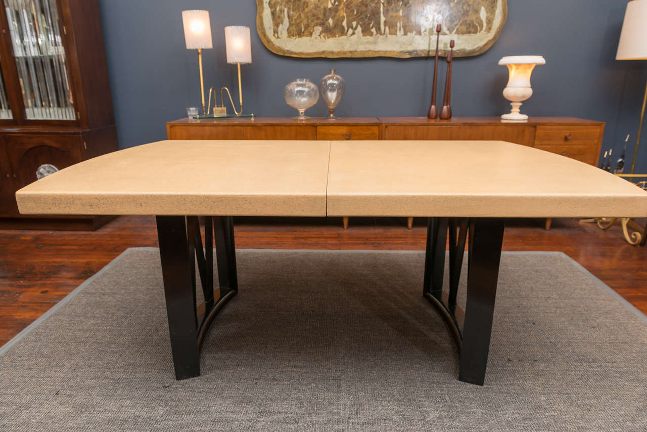 Timeless design Paul Frankl dining table with two 12"in. leaves made by Johnson Furniture Co. 
Perfectly refinished, 8ft. wide when completely open.