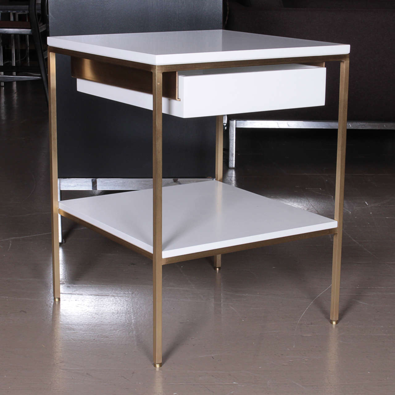 reGeneration satin lacquer and brass bedside tables shown here in our standard, BM soft chamois satin white lacquer.  Metal finishes are solid brass, stainless steel, or powder coat.  