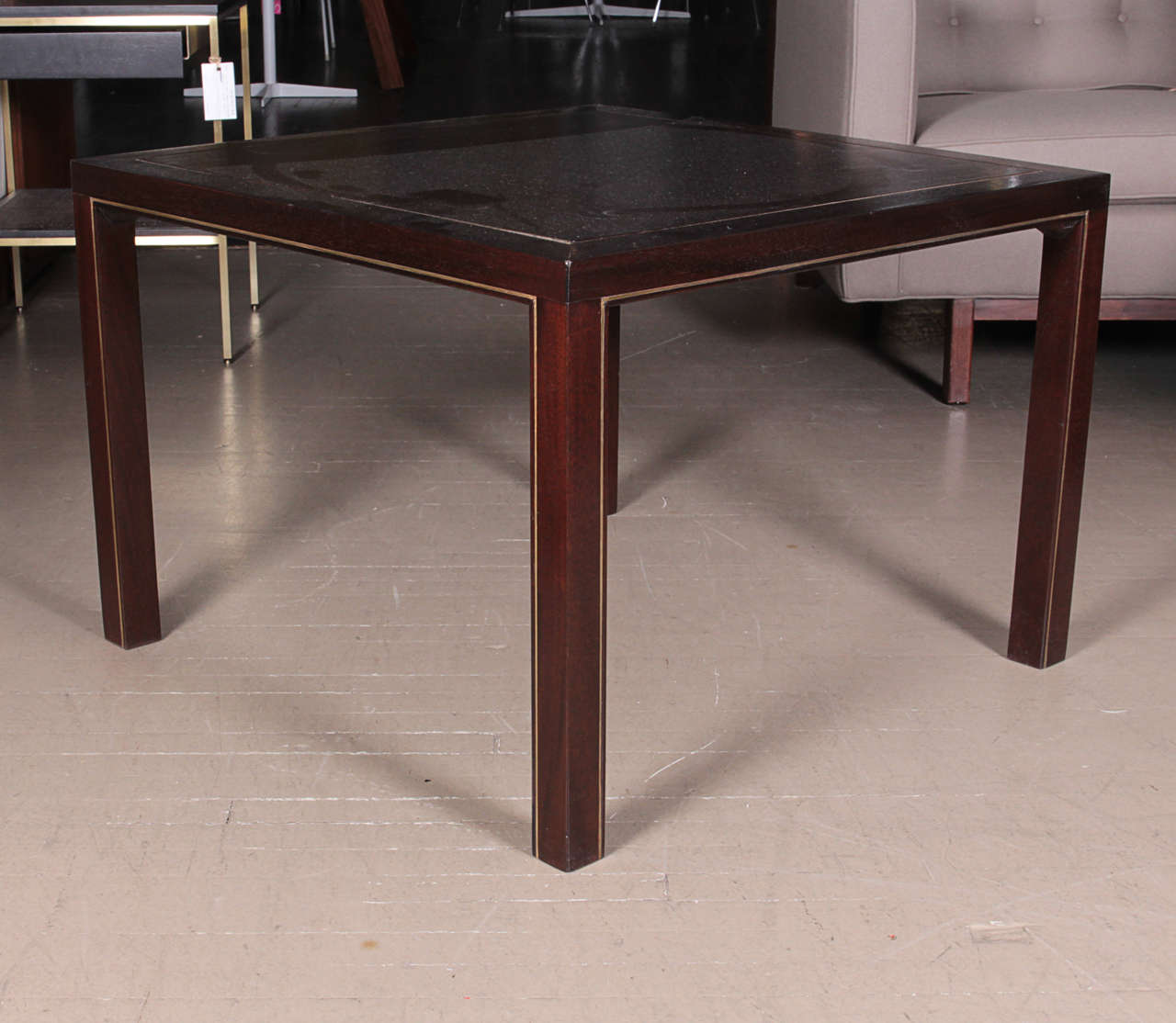 Mahogany Parsons style end tables with inlaid brass on the top and around the legs designed by Edward Wormley for Dunbar, circa 1960s.