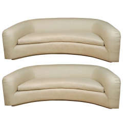 A Pair of Crescent Shaped Sofas