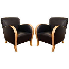 A Pair of Leather Club Chairs