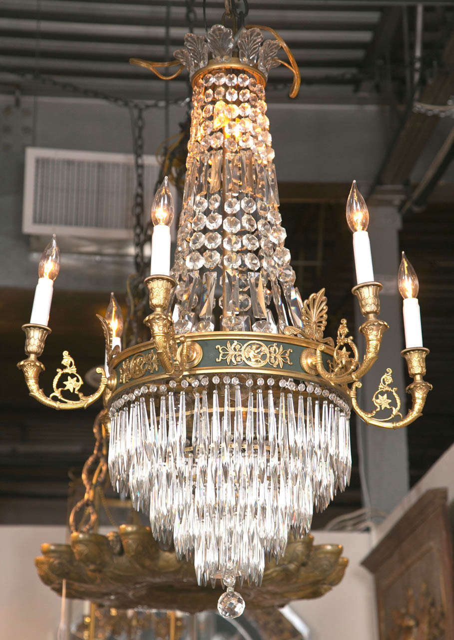 A feather crown bronze & crystal six arm, eleven lite Empire, Neo-Classical style chandelier attributed to  Caldwell.