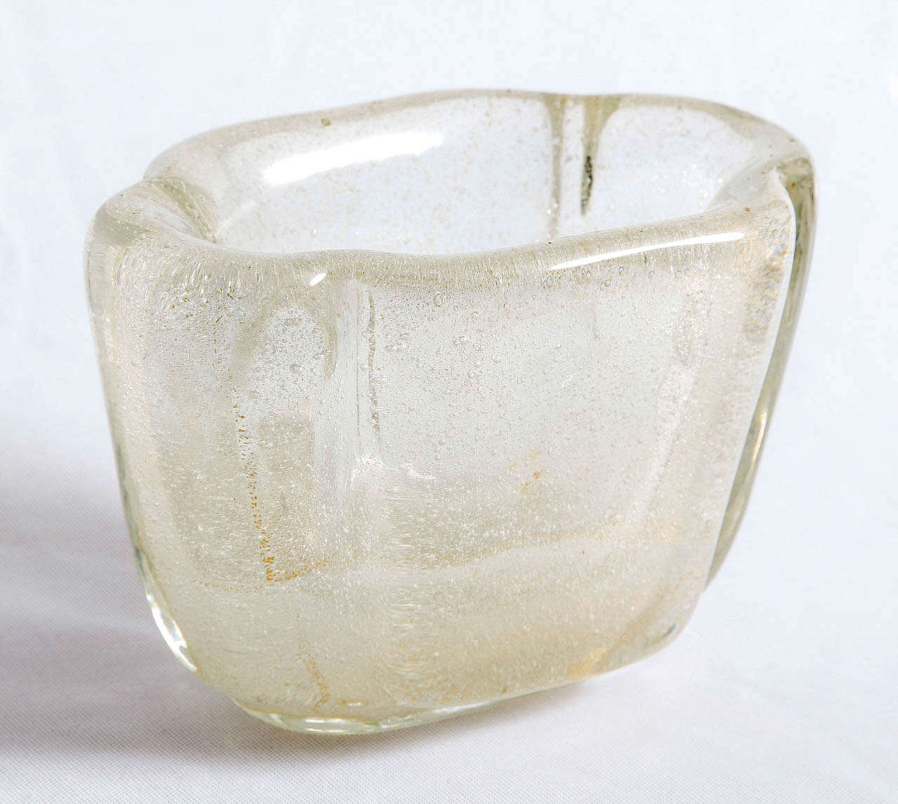 A 'Sommerso' vase designed by the Italian architect Carlo Scarpa (1906-1978) and exceuted by Venini, glassworks located in Murano (I), circa 1935. Model number 3569. Four lines acid-stencilled marks under the base (see image 6)