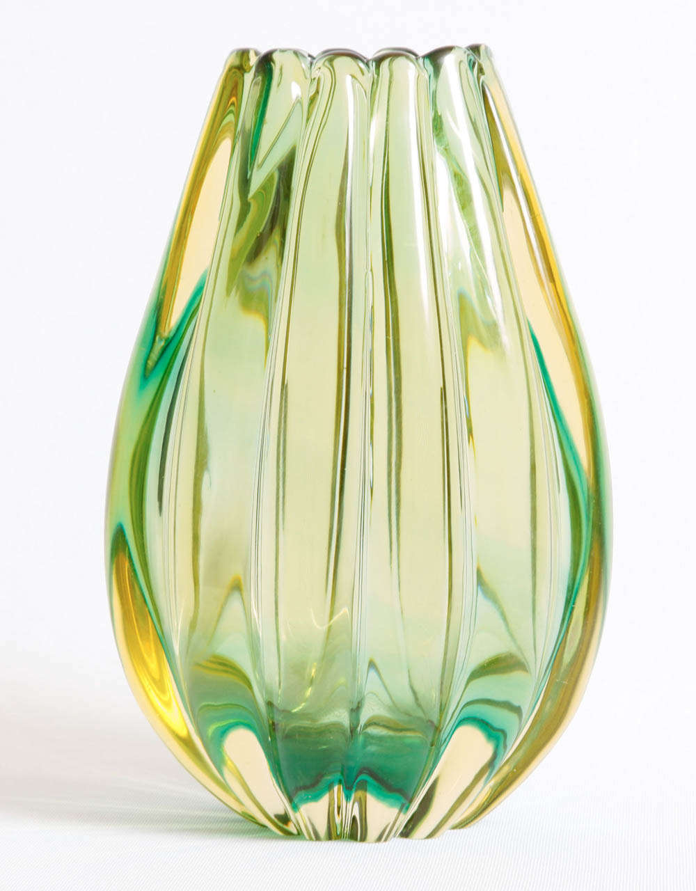 Two ribbed glass vases designed by Flavio Poli (1900-1984) and executed by Seguso Vetri D'Arte, glassworks in Murano, Italy.
These two vases (model number 12024) illustrated in Marc Heiremans, 'Seguso Vetri D'Arte, Murano Glass Objects from Murano