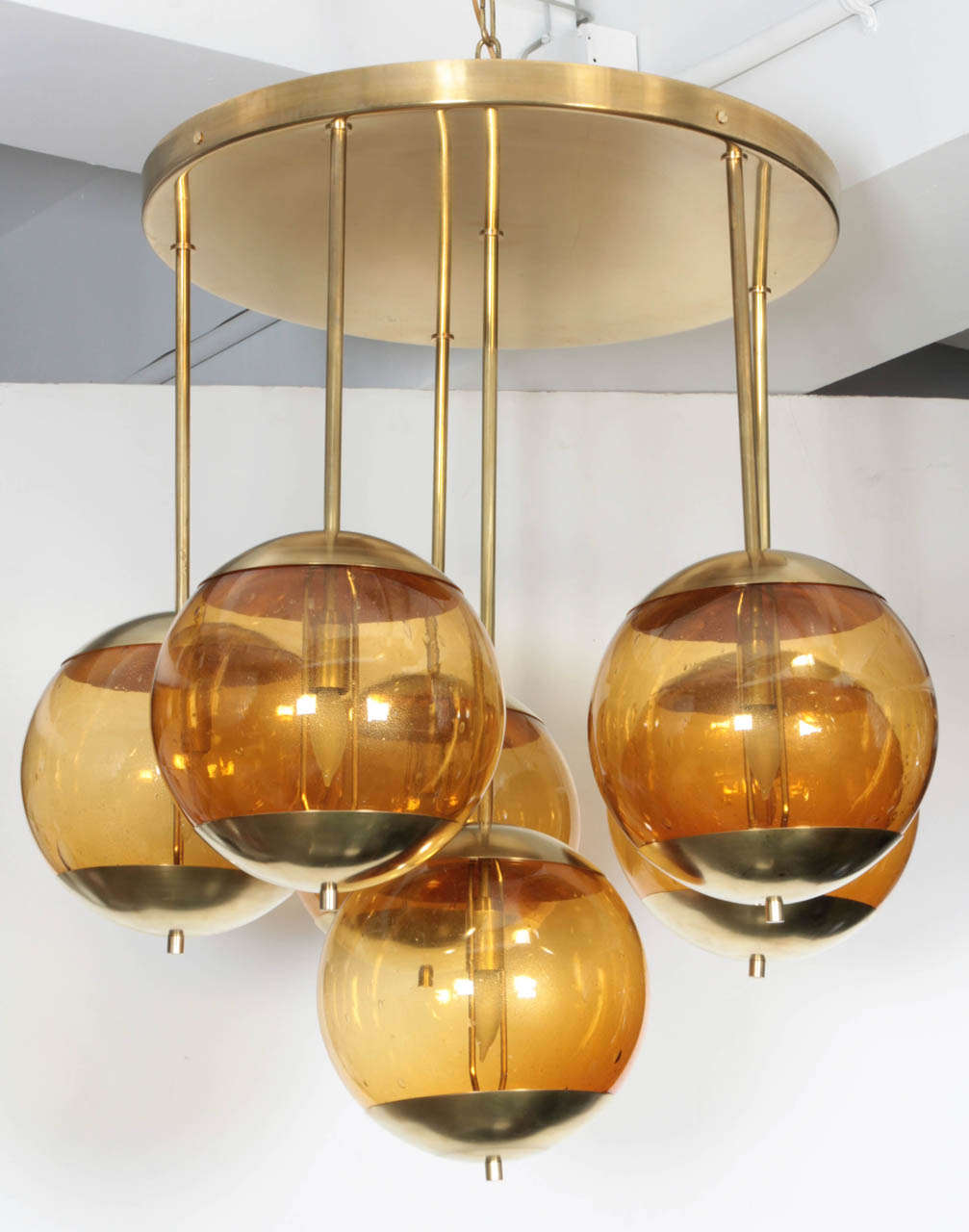 Large chandeliers 
Each one has 6 amber glass
The frame is in brass
