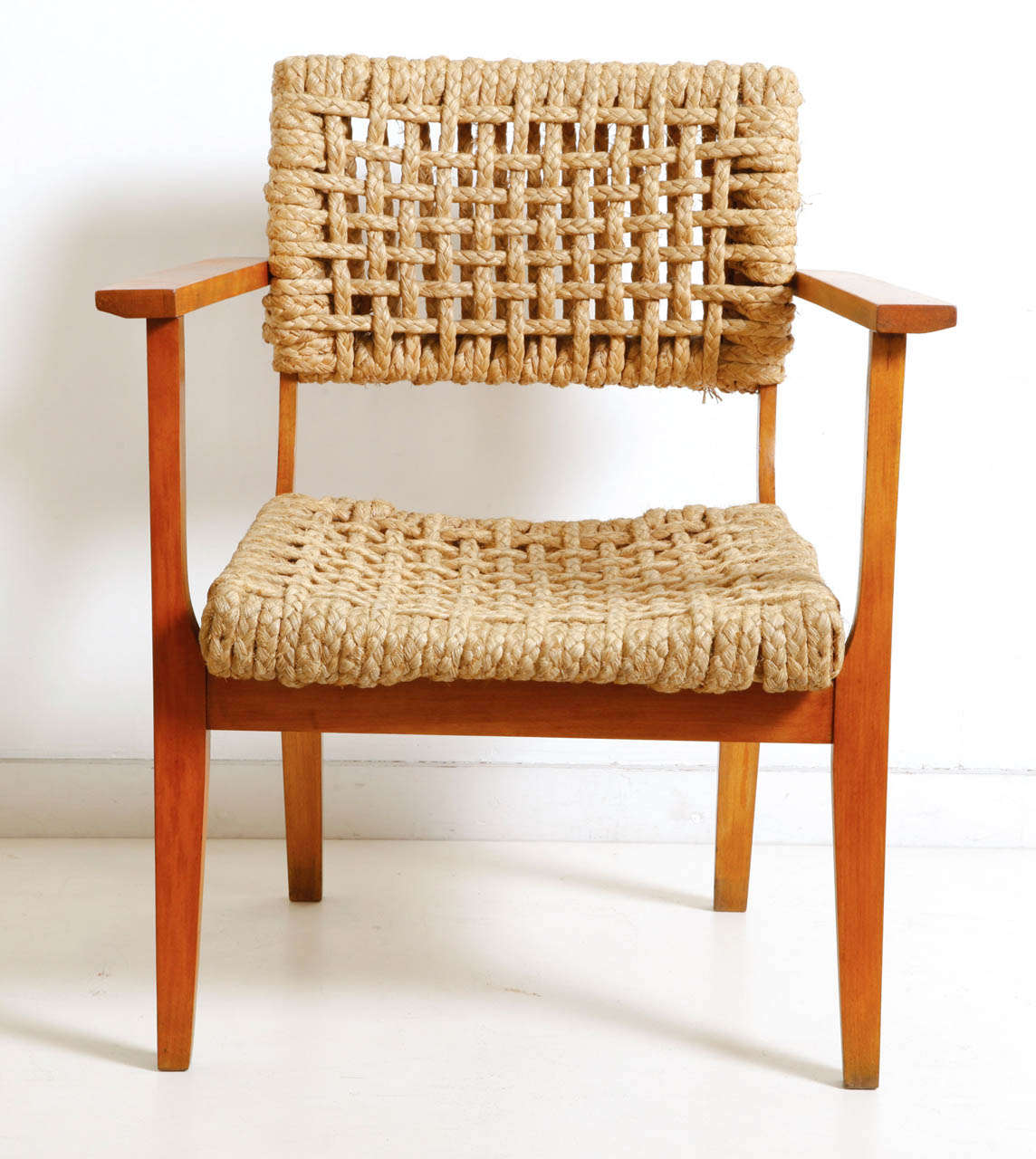 Rare low armchairs by Audoux-Minet in oak with braided rope seat and back.
Edited by Vibo, France circa 1950.