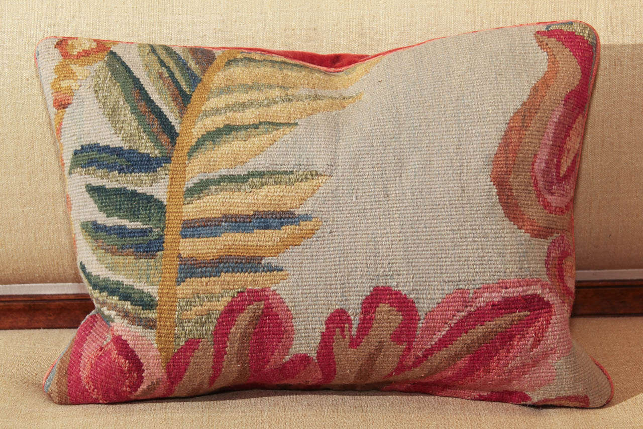 A pillow made from an antique Aubusson fragment. Backed with Mohair with a feather down fill.