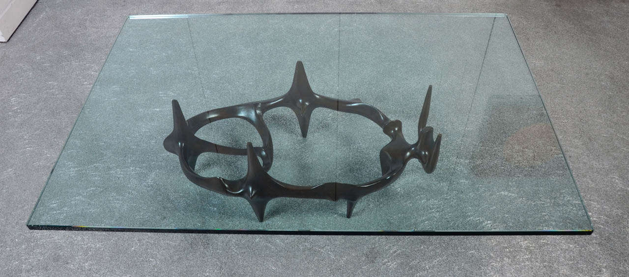 A bronze low table by the late Romanian sculptor Victor Roman, who worked and lived in Paris. The table is signed and numbered 2 of an edition of 25. Designed circa 1970, the table is typical of the artist's surrealistic style.