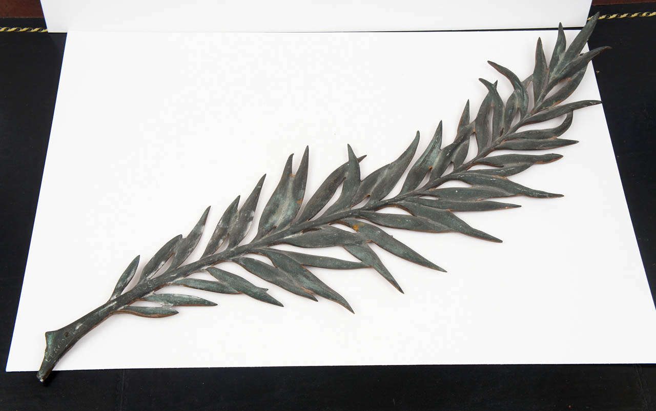 Bronze patinated palm frond wall ornament. Provenence Colefax & Fowler.
Signed "Leander".